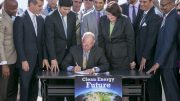 California Gov. Jerry Brown signs SB350 on Oct. 7, 2015. The bill calls for increasing the state’s renewable electricity use to 50 percent and doubling energy efficiency in existing buildings by 2030. AP Photo/Damian Dovarganes