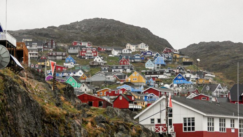 Colorful houses dot the hillsides in Qaqortoq. Photo credits: Maddy Keyes/Inside Climate News